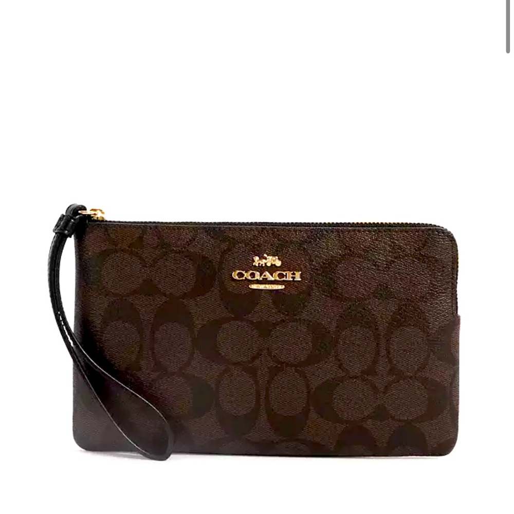 Coach larger Corner Zip Wristlet In Signature Canvas